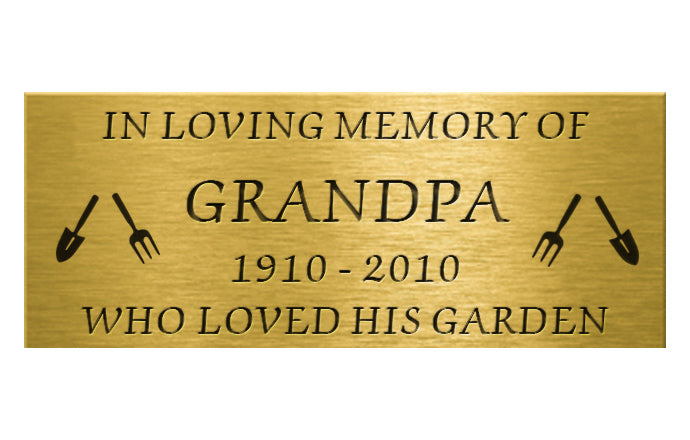 Memorial plaque for Grandpa with gardening tools on a white background