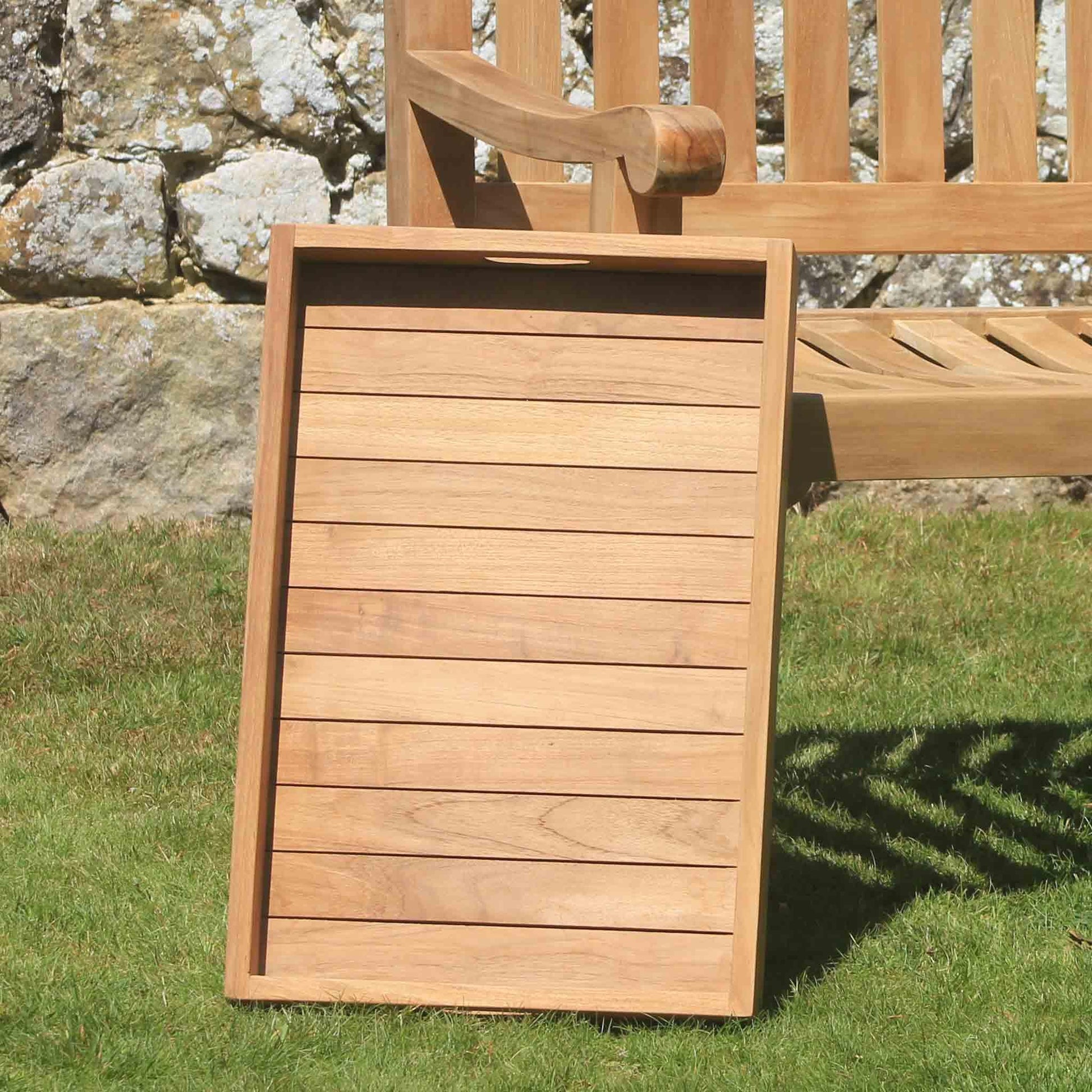 garden side table and tray in a garden setting