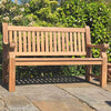 memorial bench in a garden setting