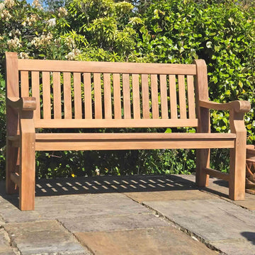 memorial bench in a garden setting
