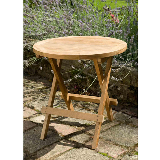 outdoor coffee side table in a garden setting