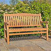 bereavement bench in a garden setting on a patio