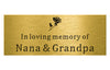 brass plaque with 'In loving memory of Nana & Grandpa' text and rose design on a white background