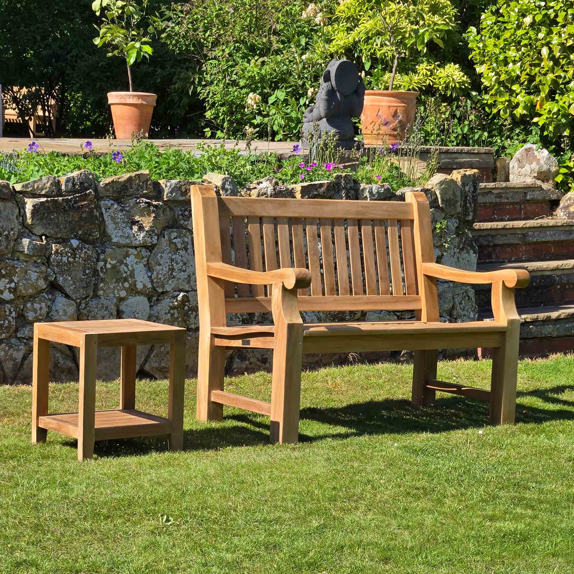 coffee table for outside in a garden setting with greenery