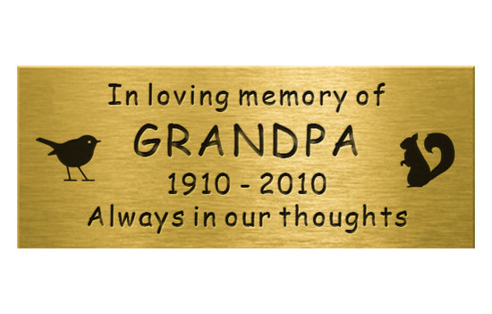 Memorial plaque for Grandpa with engraved text on a gold background