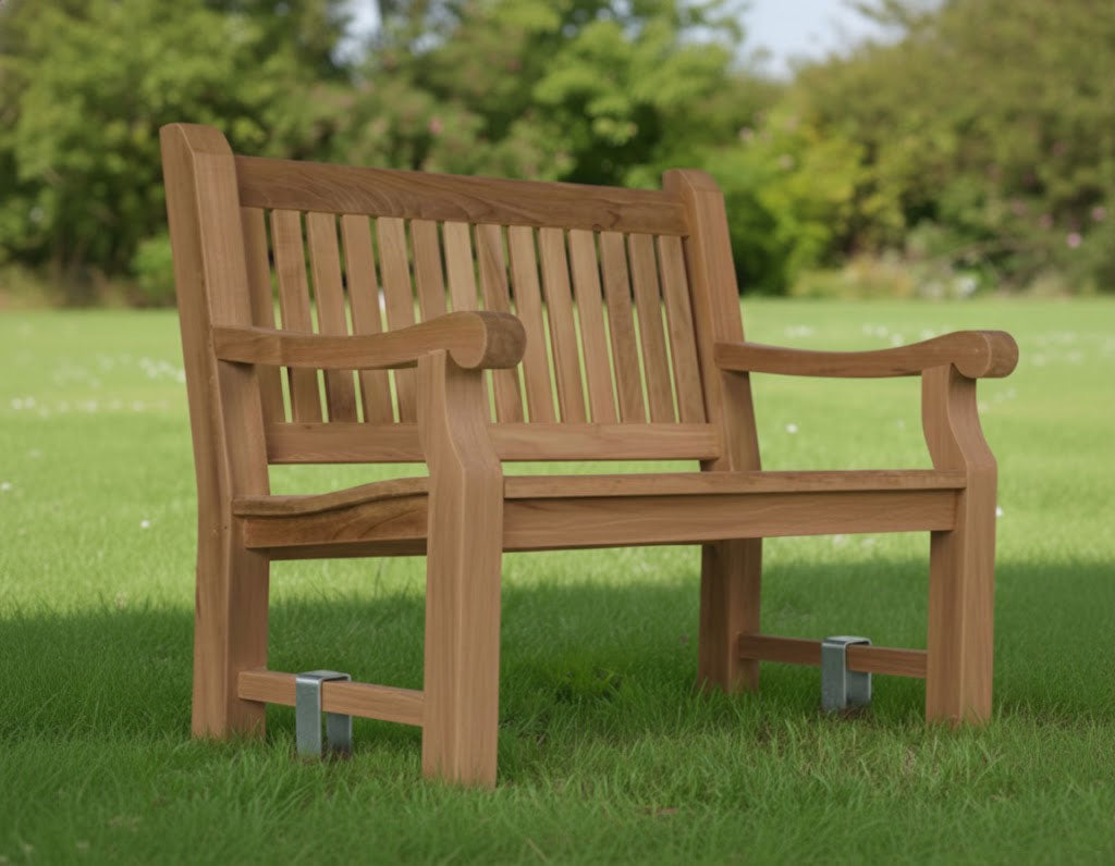 a garden bench anchored in the grass