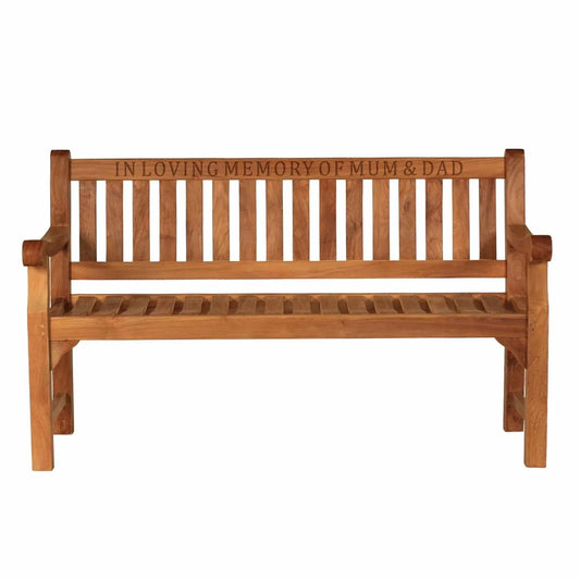 a memorial bench and plaque with wood engraving