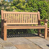 wooden memorial benches on a patio