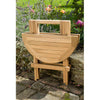 folding outdoor coffee side table in a garden setting
