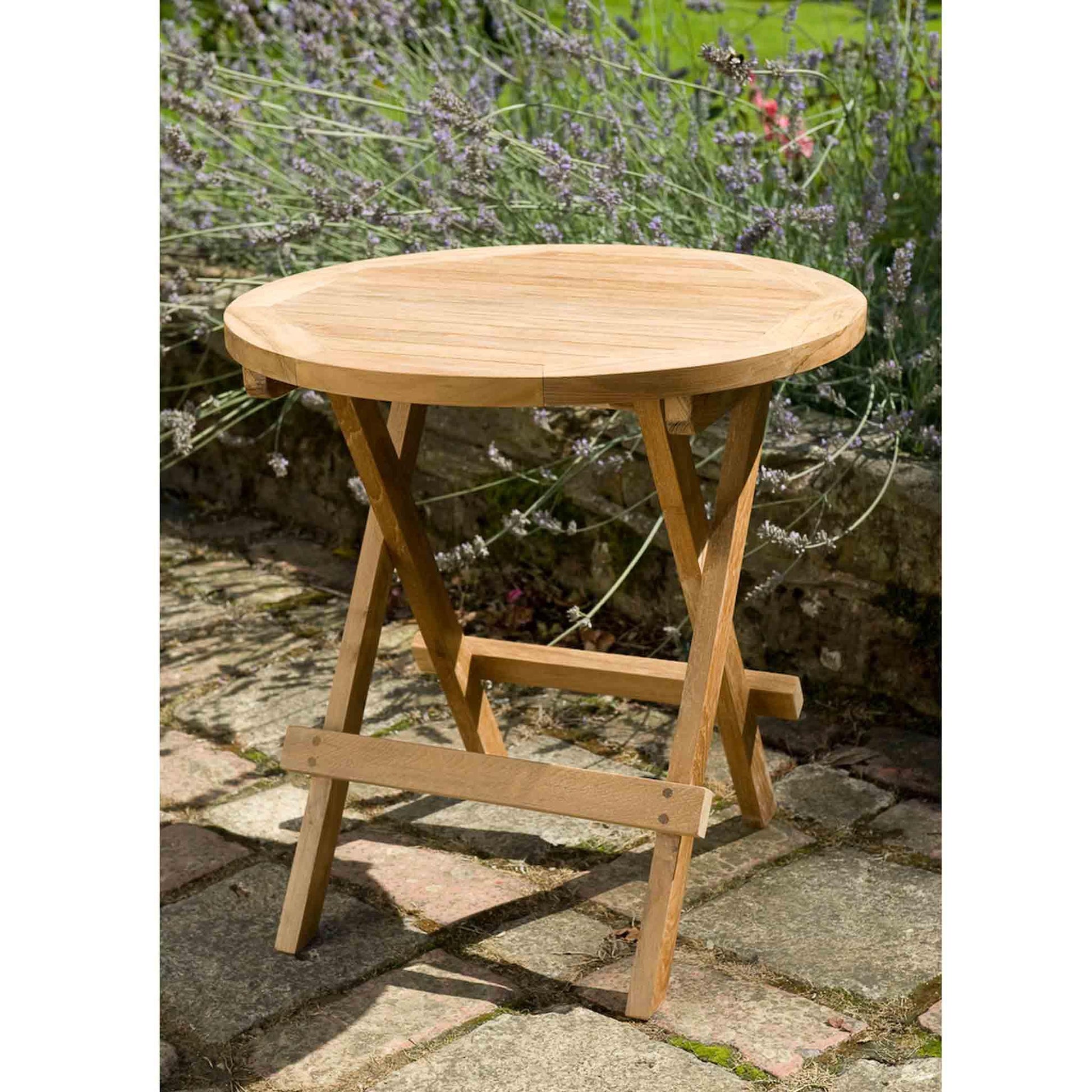 outdoor coffee side table in a garden setting