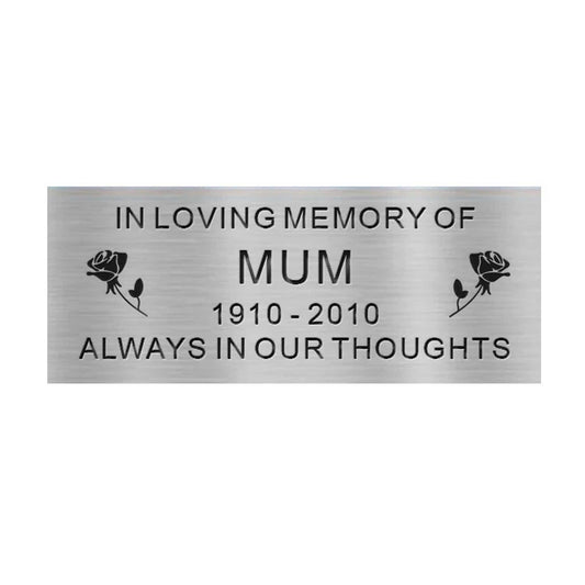Memorial metal plaque for 'Mum' with roses on a white background