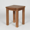 Wooden teak garden side table on a white background