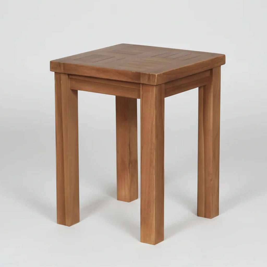 Wooden teak garden side table on a white background