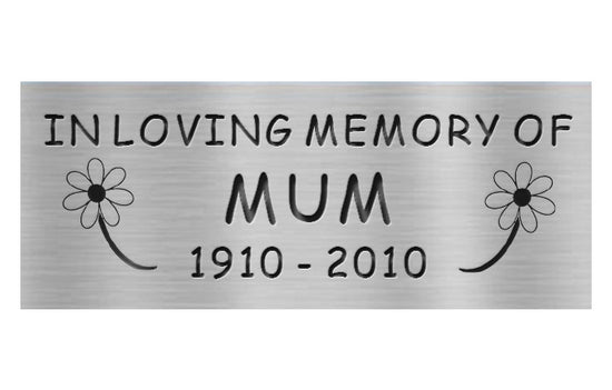 Memorial plaque for 'In Loving Memory of Mum' with daisy designs on a white background