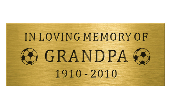engraved brass plaque with pictures