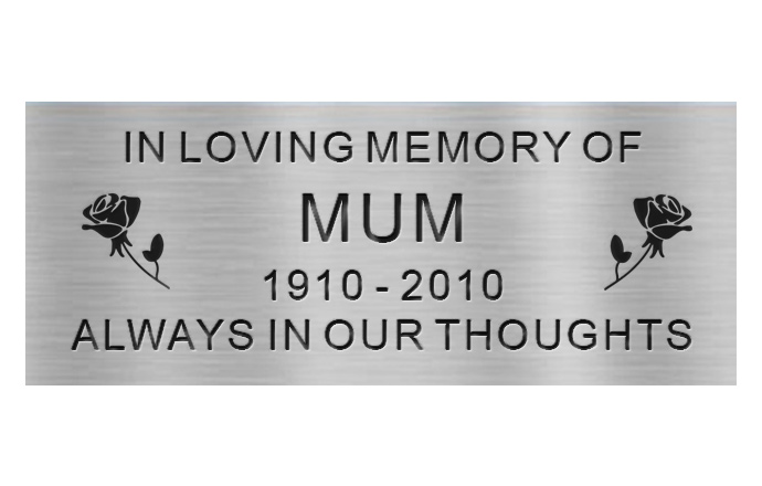 engraved stainless plaque with words and rose